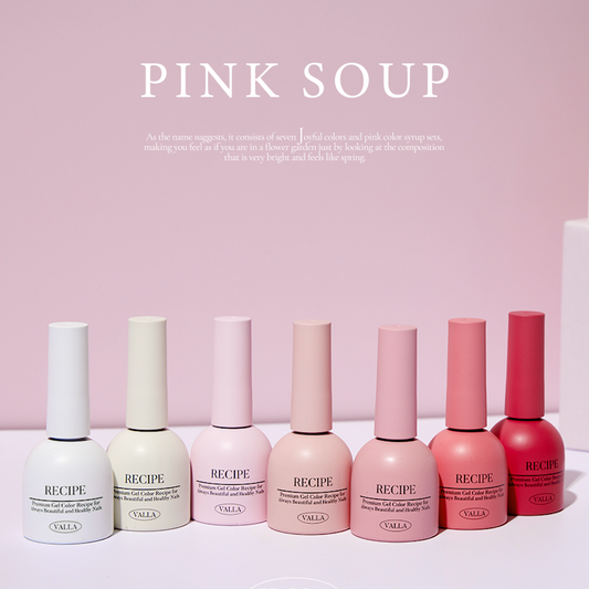 A range of pink and nude gel polish bottles in soft lighting, from Valla Pink Soup.