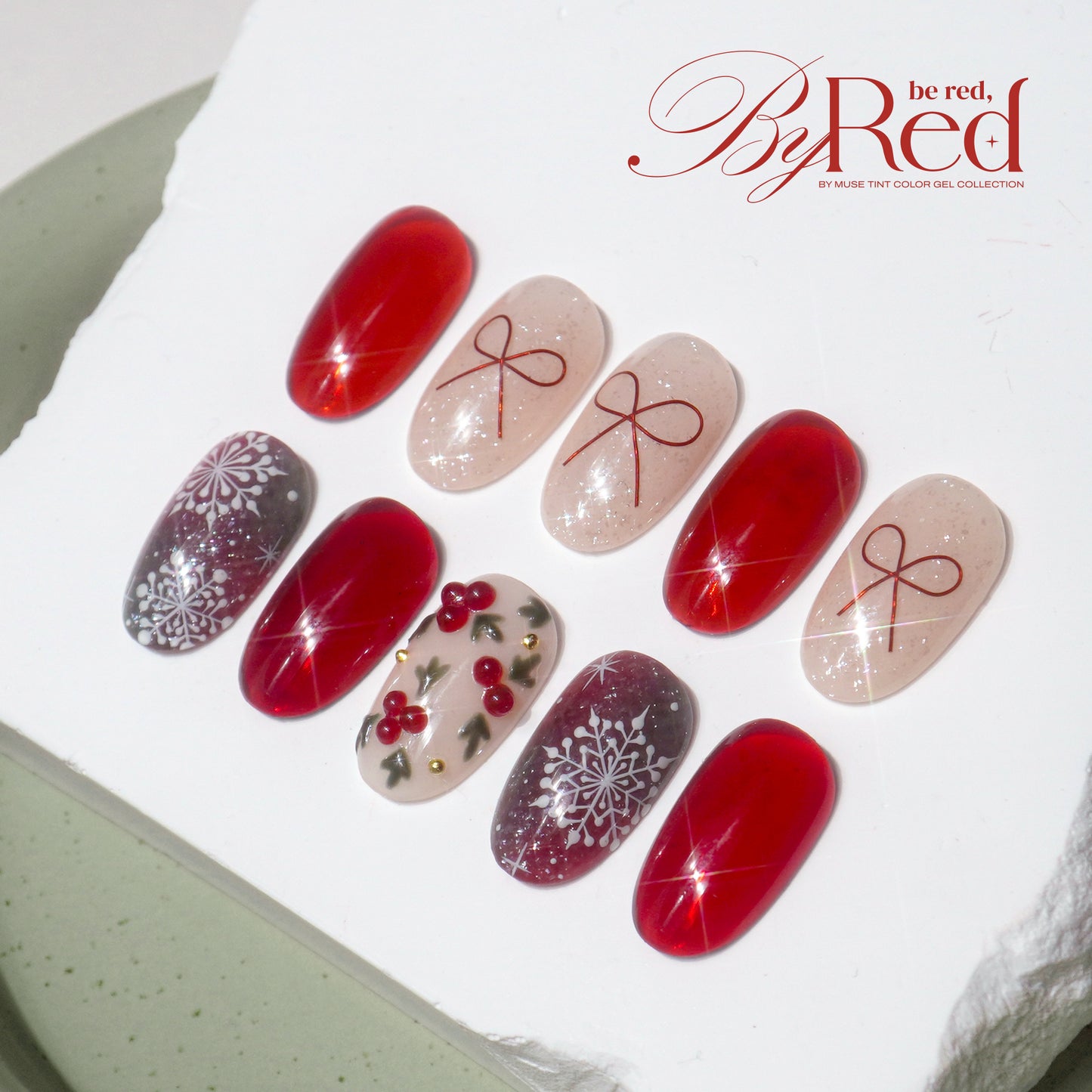 By Red festive nail designs with bows and snowflakes
