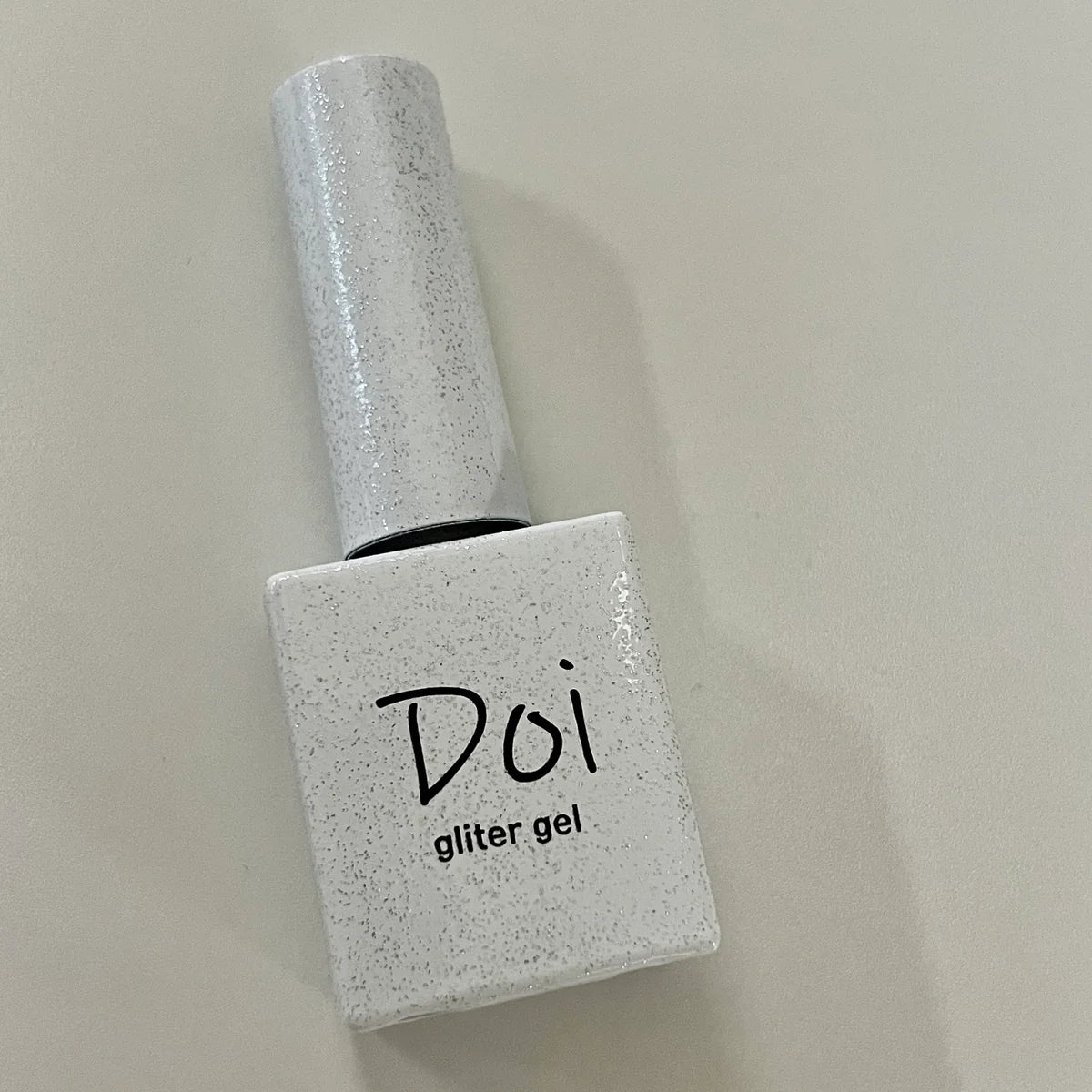 Doi White Silver Glitter Gel – frosty shimmer builder gel with silver flakes