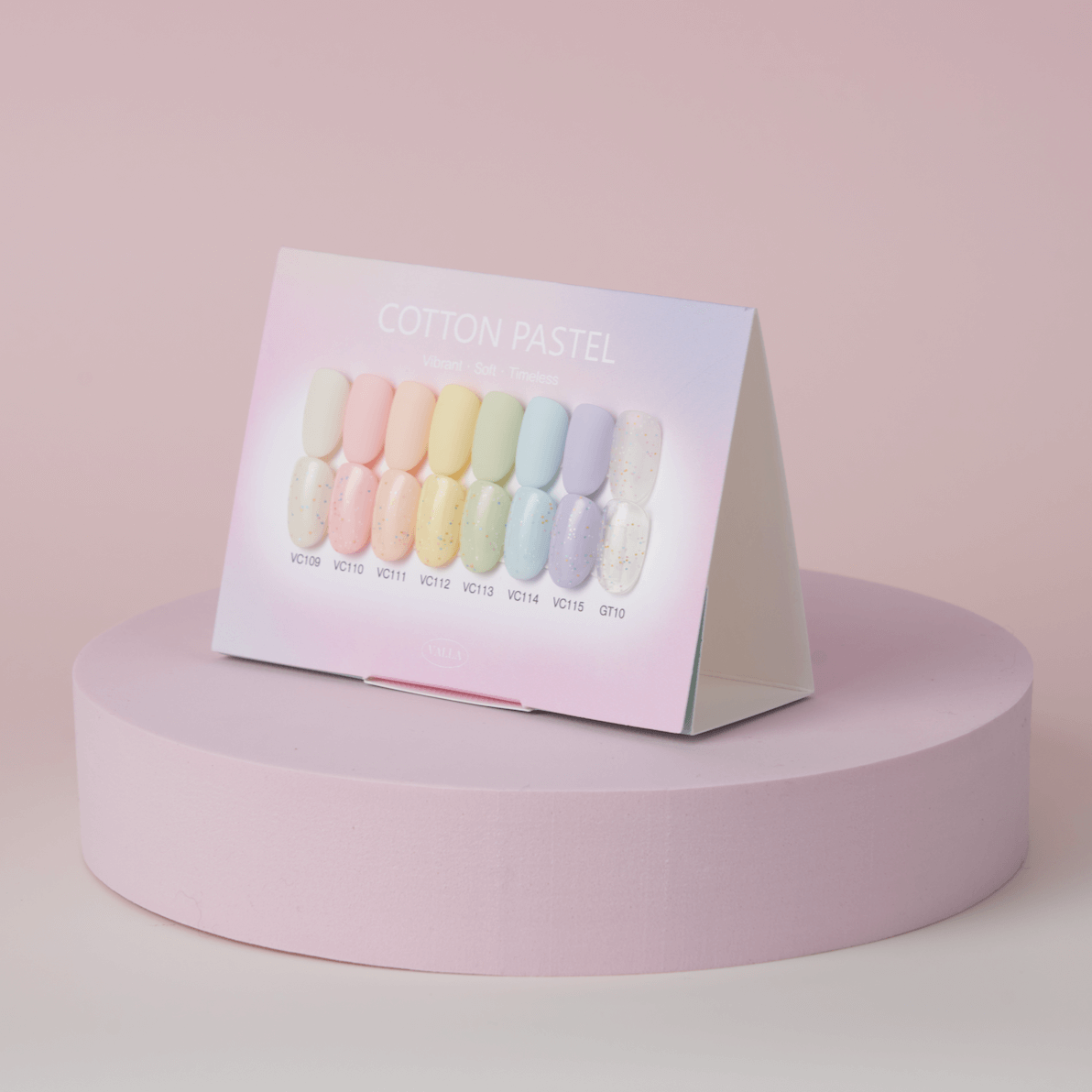 Valla Gel Cotton Pastel swatch card on pink pedestal – clean and minimal nail color showcase
