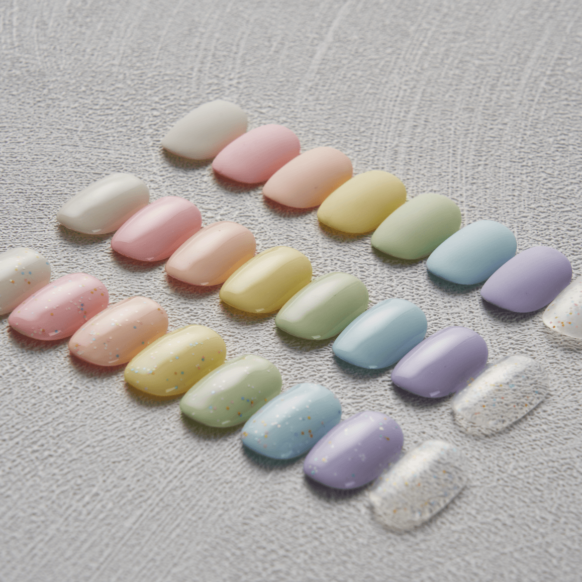 Valla Gel Cotton Pastel swatch card on pink pedestal – clean and minimal nail color showcase