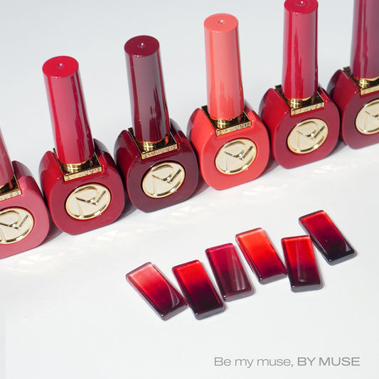 By Red Collection – bold red polish bottles with gold detailing