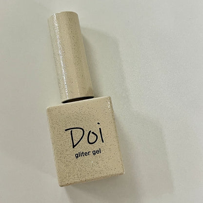 Doi Sand Gold Glitter Gel – warm-toned golden sparkle gel for nails