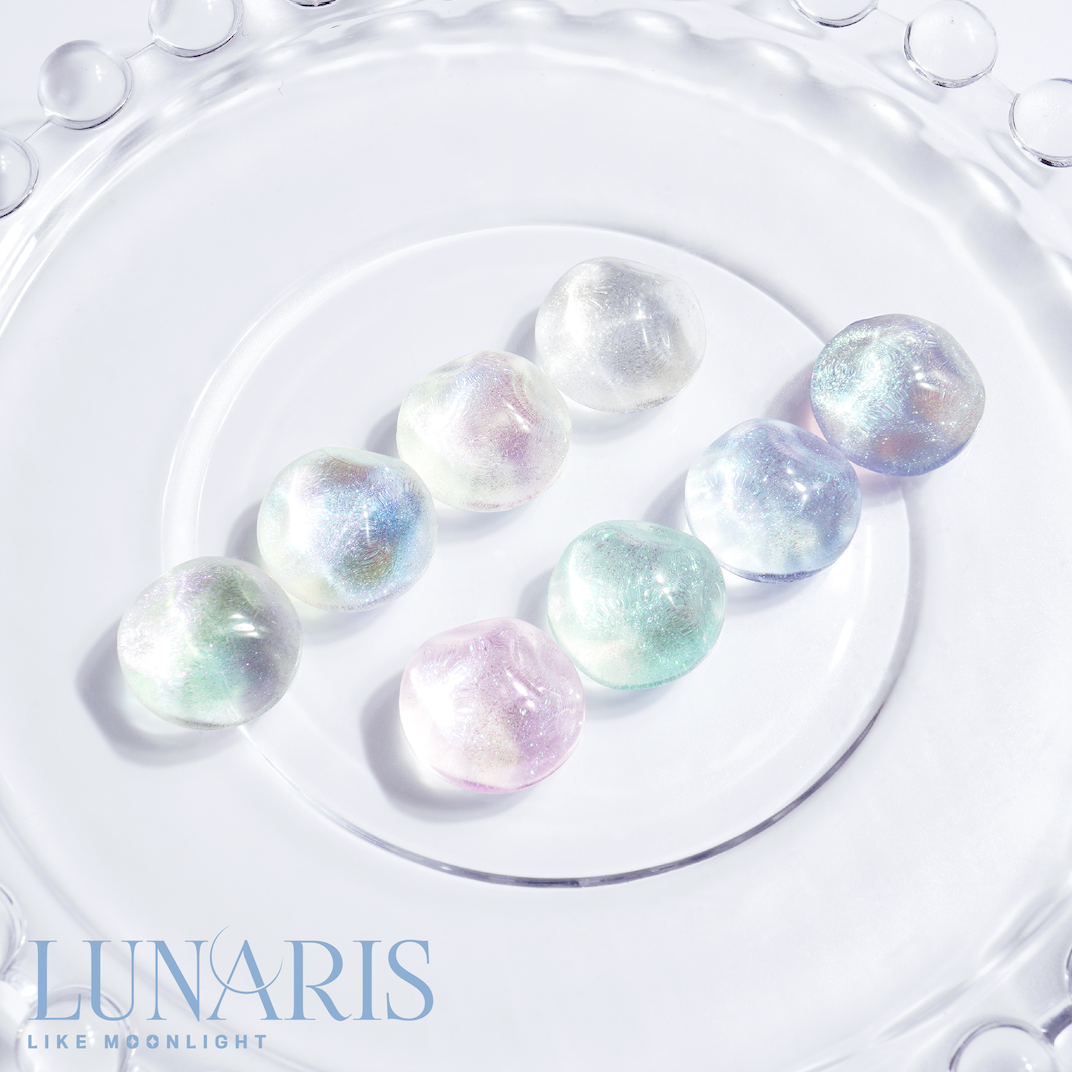 Press-on shimmer nail art in soft pastel tones